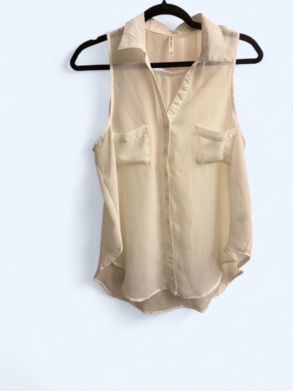 Sleeveless Cream Button-Down Blouse with Chest Pockets